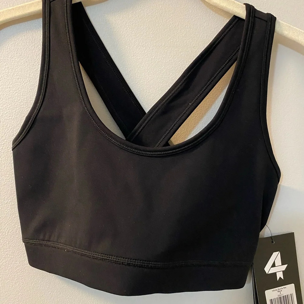 NWT Fourlaps Infinity black cross back sports bra size small